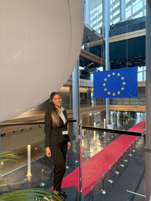 A student with the EU flag.